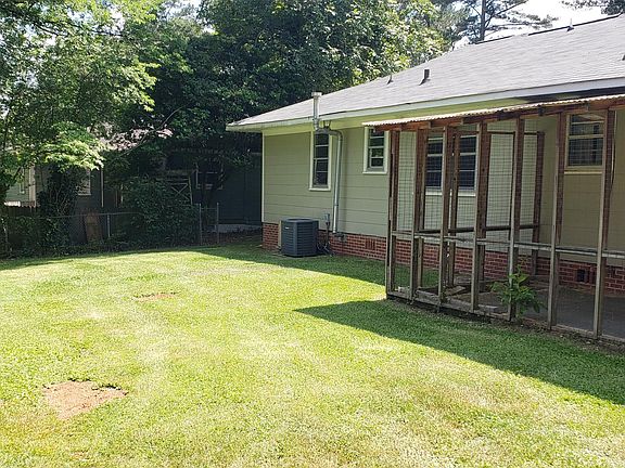 Back yard with enclosed porch