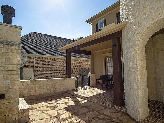 A flagstone patio offers additional seating space for small gatherings!