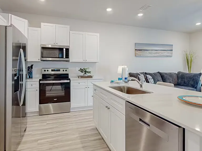 Beautiful kitchen, microwave stove, top dishwasher refrigerator , breakfast bar, all new