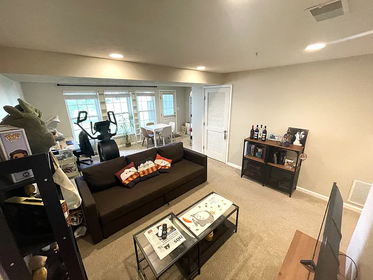 Entry level space. Visible door is laundry room