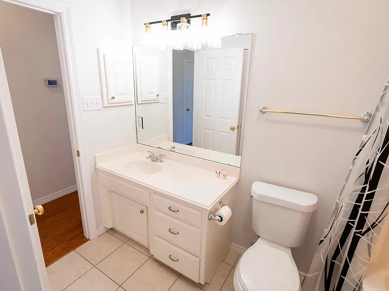 Full Bath attached to guest room and also accessible from the hallway