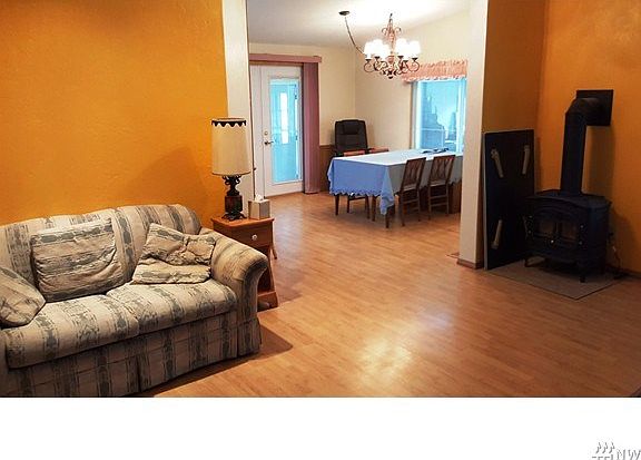 View from front door thru living room to dining room.