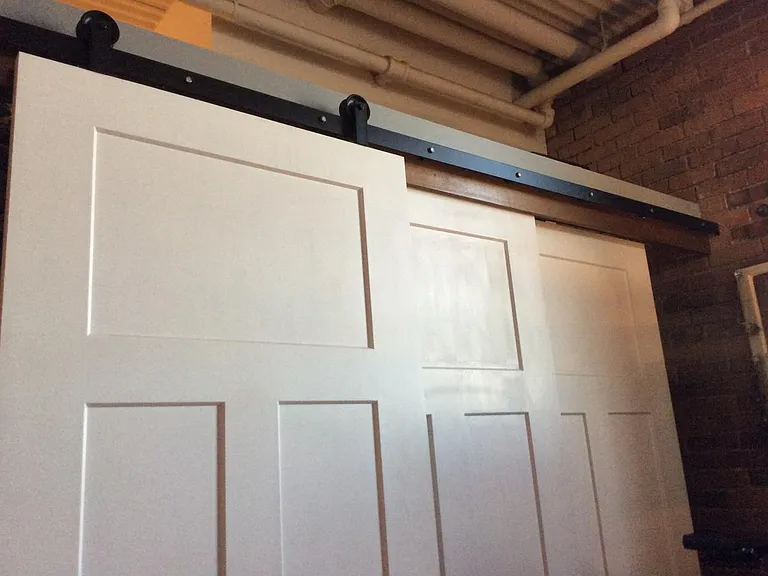 Barn door closets in master bedroom