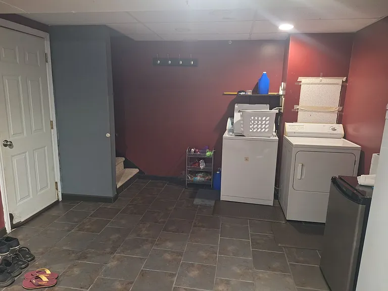 Basement laundry, connects to garage