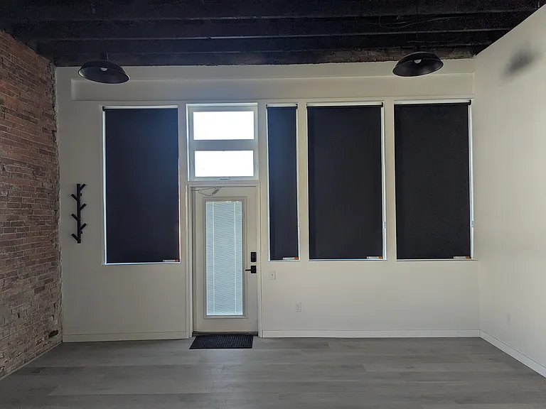 Storefront windows with blackout shades