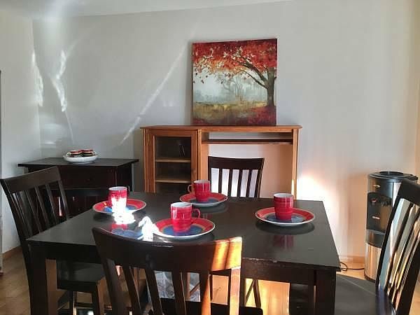 Dinning table with dishes and place setting