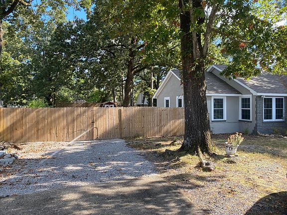 Front of house - Gated entrance to backyard