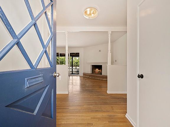 Entrance to landing area and Living Room