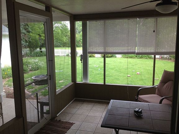 The porch was updated last fall with paint, ceramic tile, and an indoor/outdoo