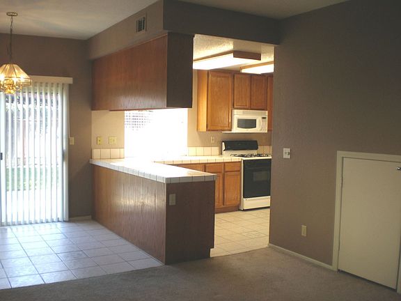 Open kitchen w/tile counters