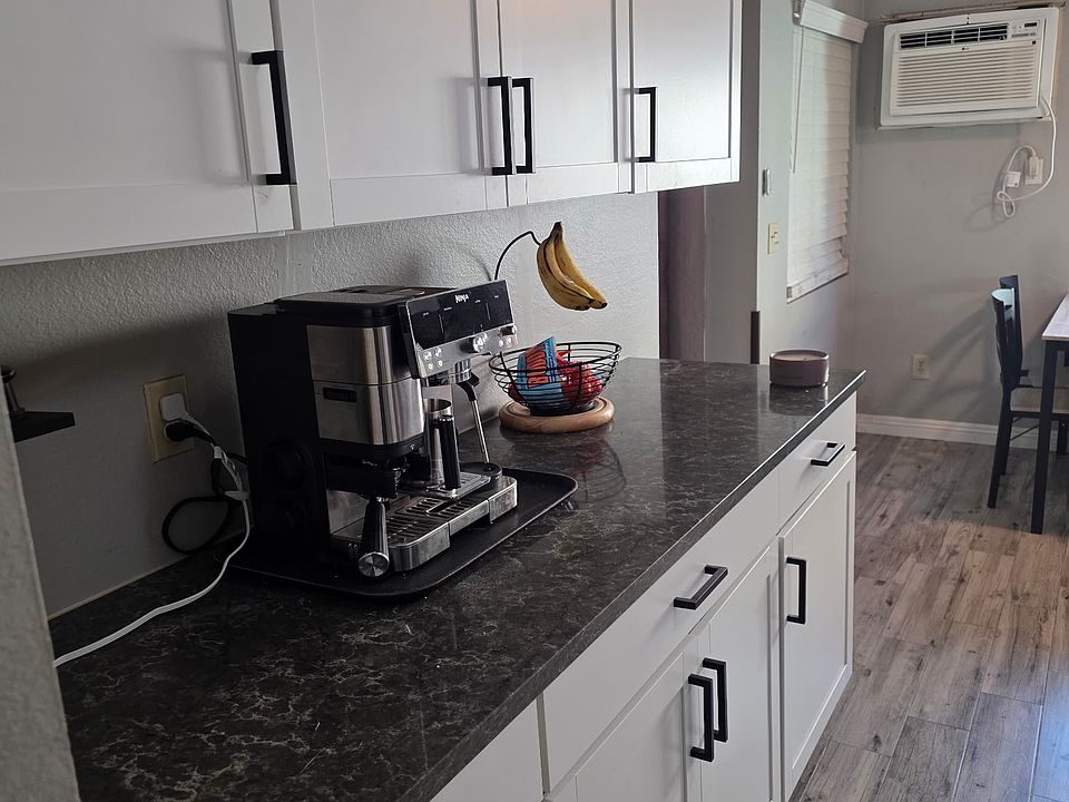 Kitchen. Full remodel in 2021. Quartz counter tops and porcelain tile.