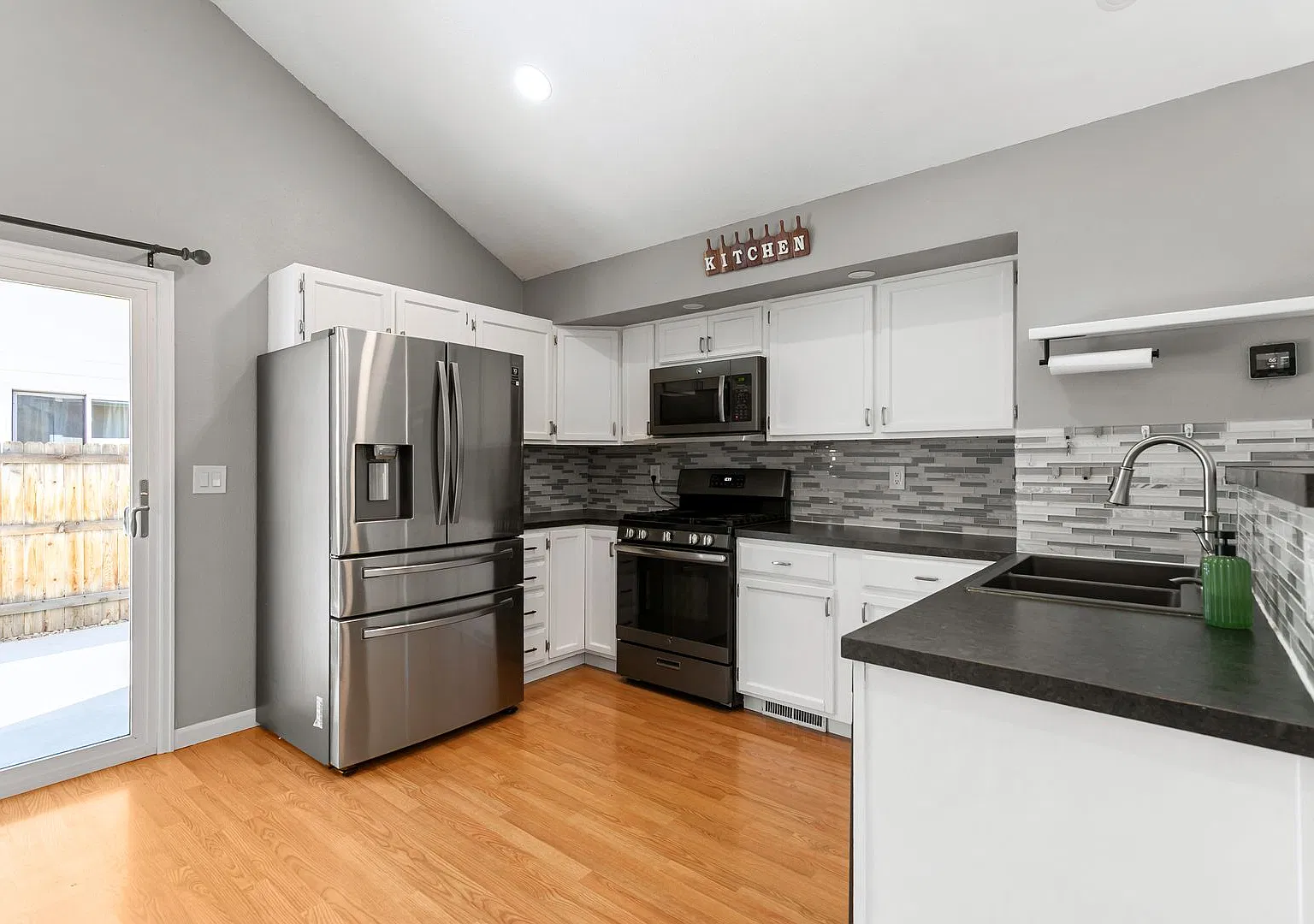 Split-Level Loveland Home with Updated Kitchen, Fenced Yard & Central AC — Photo 3