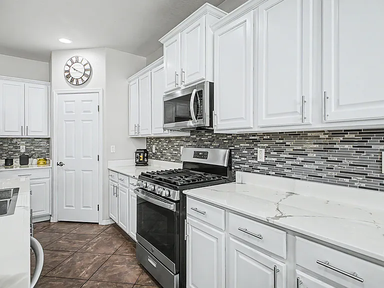Kitchen view with pantry door