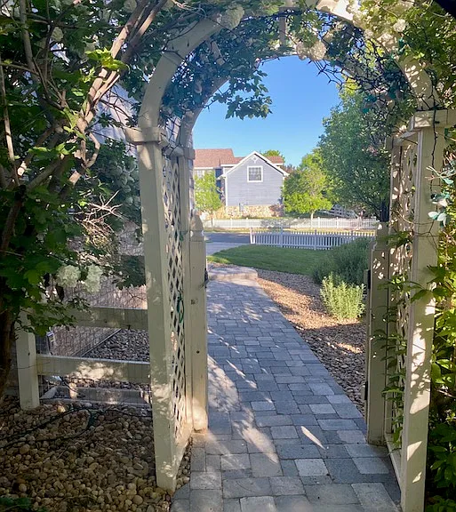 Leaving the backyard via the pavered pathway