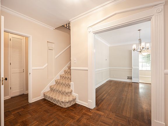 Front Foyet Leading to Dining Room and Upstairs Bedrooms