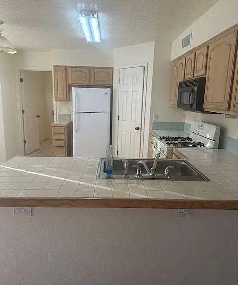 8124 Oakdale Pl NW — Photo 9