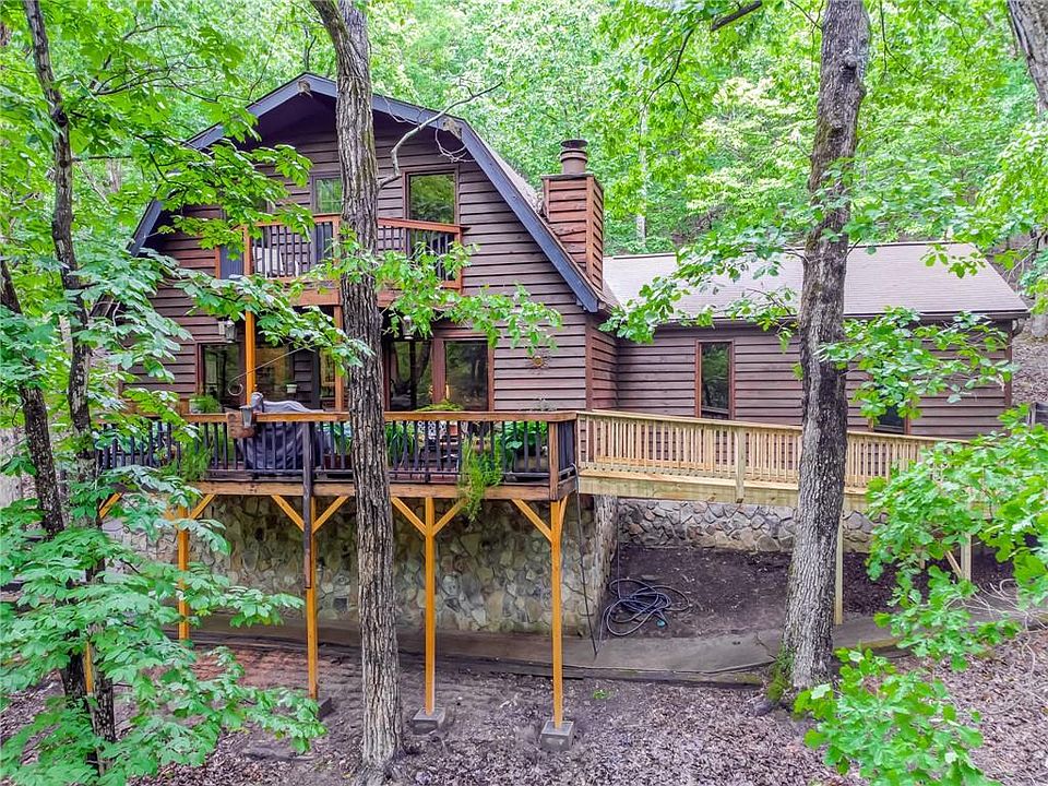 Image 1: Mountain Chalet Sits on Over 1.5Ac Wooded Lot