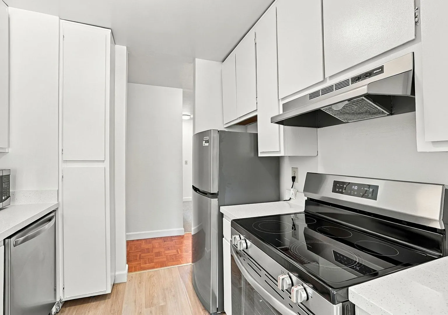 Freshly Updated Condo with Pool Views and Modern Finishes — Photo 1