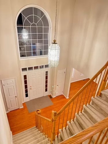 Soaring two story foyer with natural light throughout the day - 41 Sapphire Dr