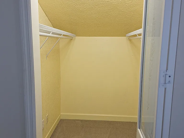 Large walk in closet in 2nd large bedroom