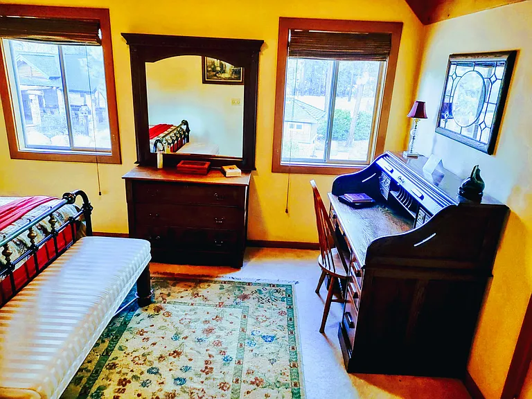 Bedroom with Large Oak Roll Top Desk