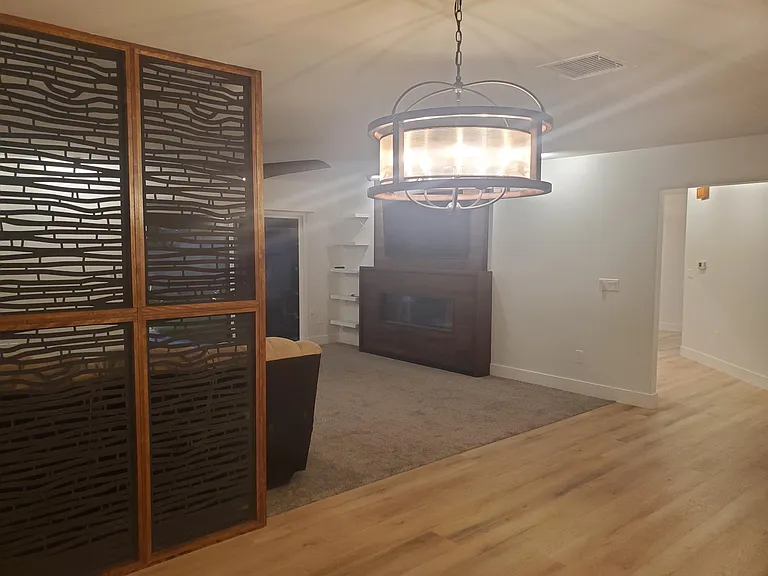 Custom room divider in dining area, adjacent to livingroom.