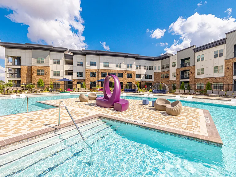 Soak up the sunshine by the sparkling pool.