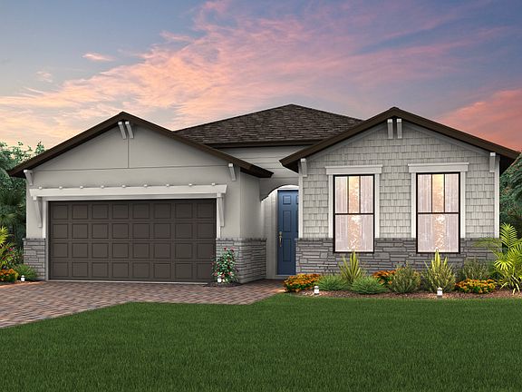 The Marina, a single-story home with a 2 car garage, shown with Home Exterior C2C.