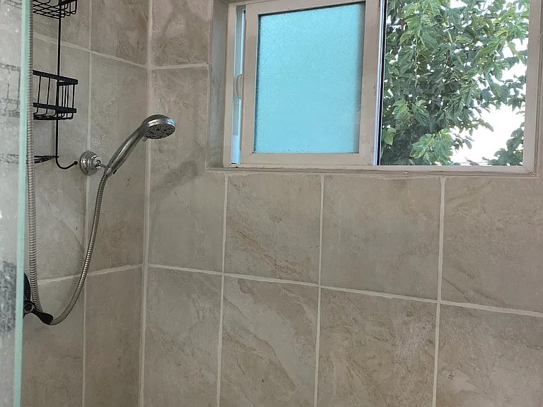 Master Suite shower. Window provides good ventilation of moisture.