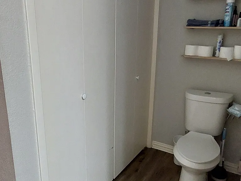 Second bedroom also has the laundry room. Washer and dryer not included