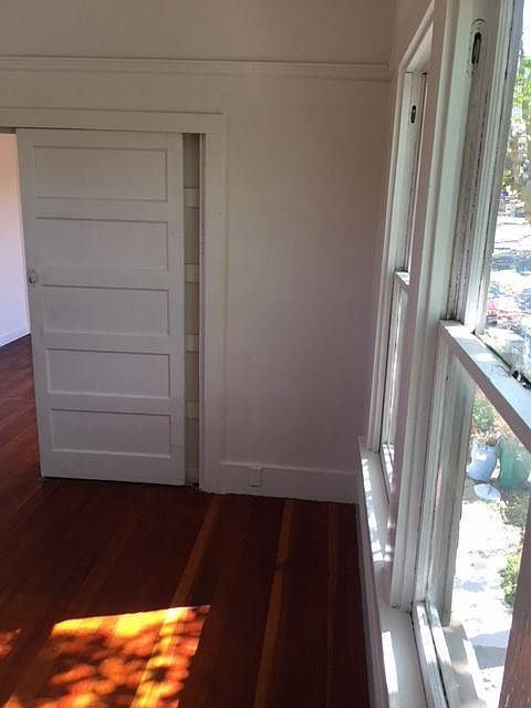sliding door between bedroom + living room