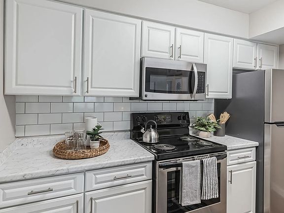 Revel in our kitchens featuring top-of-the-line stainless-steel appliances. Embrace the pristine appeal and culinary excellence in your new home.