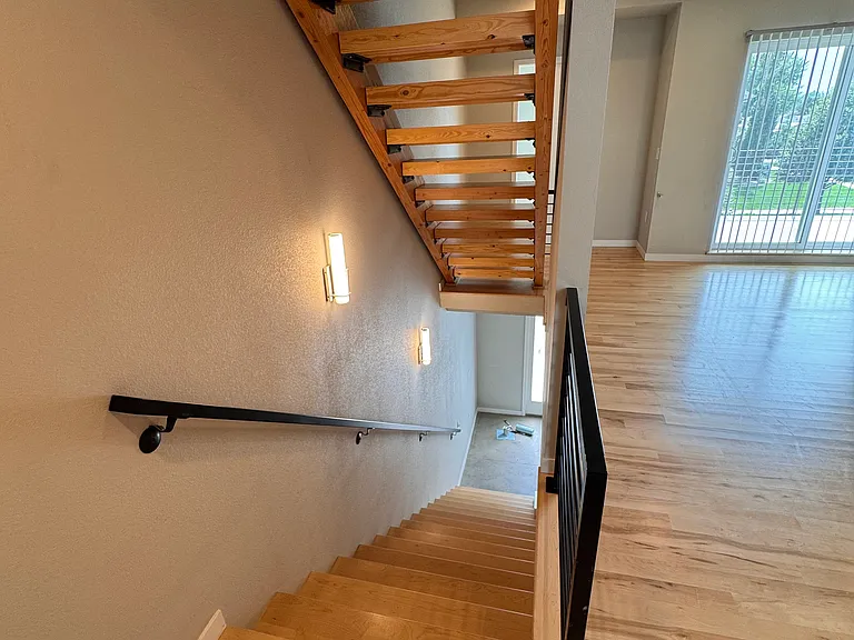 Stairway from ground floor and stairway going to third floor bedrooms