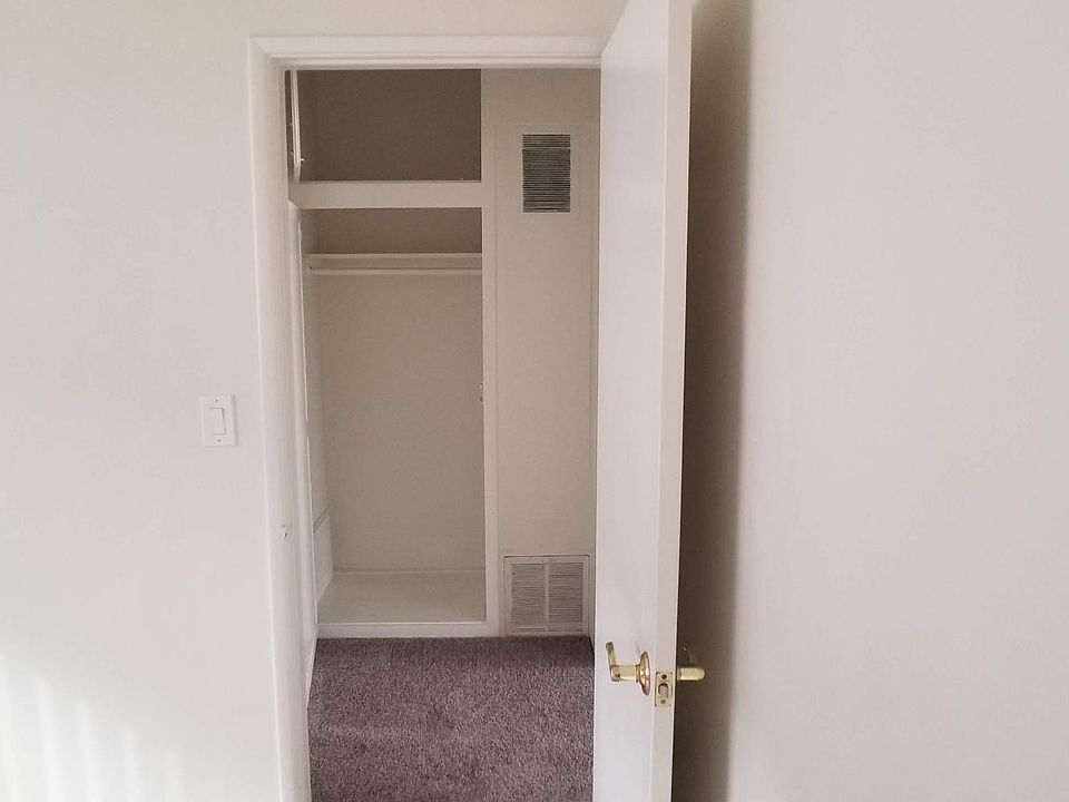 HALL CLOSET FROM BEDROOM