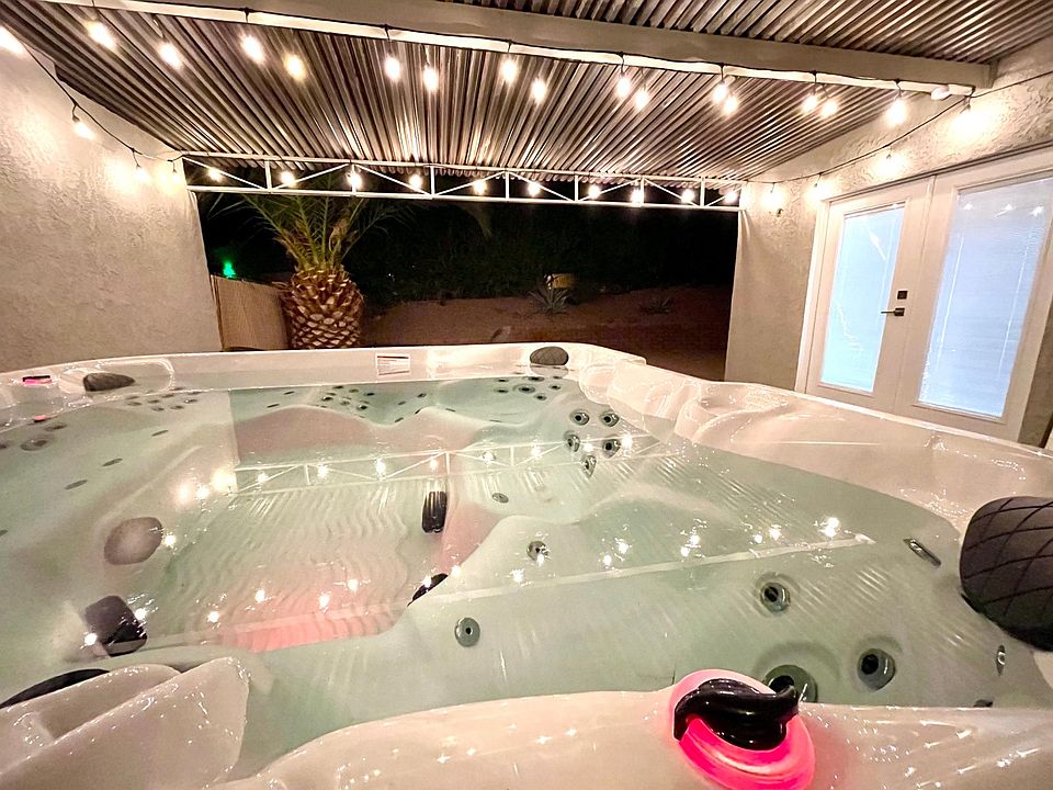 hot tub and back yard