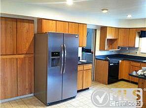 Updated kitchen w/stainless stove&fridge.
