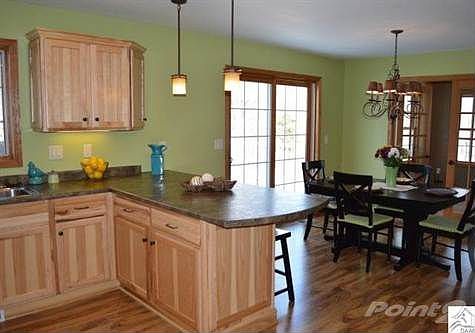 Breakfast bar plus informal dining with sliding doors to a huge deck and back yard