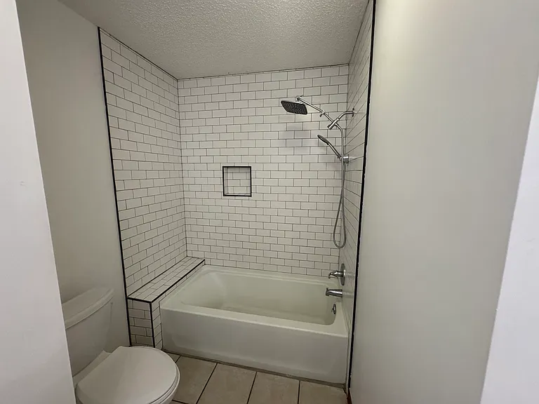 2nd Story shower/tub combo and lavatory