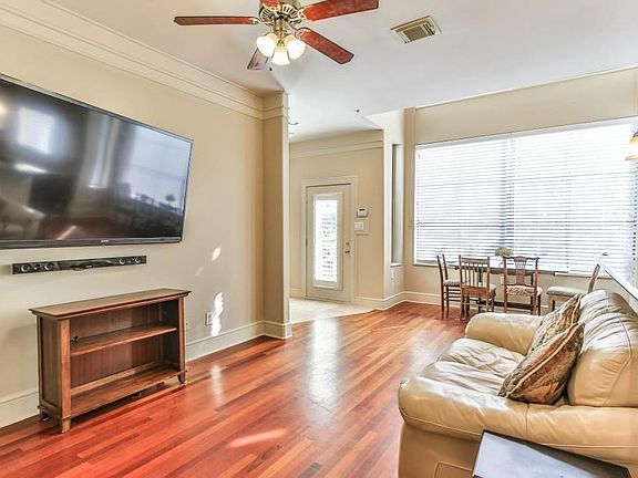 View of the living room over looking breakfast area. Some may use this area as a dining room.