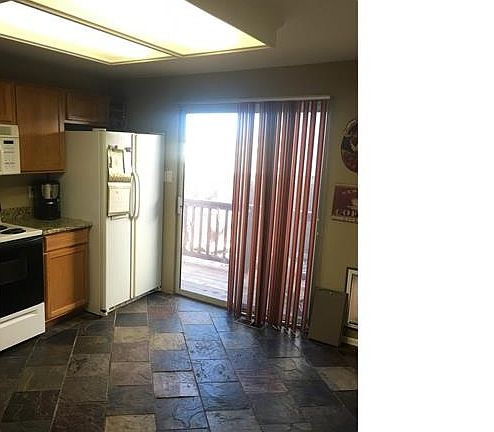 Kitchen: Slate tile floors
