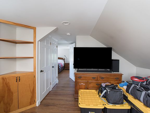 Living room is the central part of the apartment with lots of light coming from the windows in the living room and kitchen.