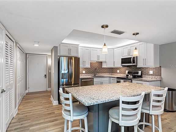 5th image of 7700 Sun Island Dr S APT 107