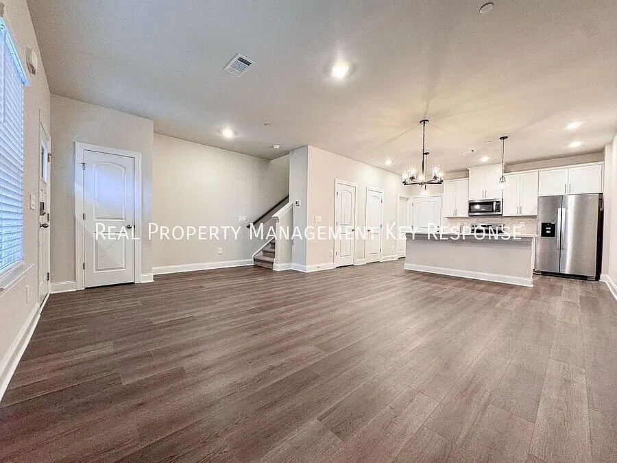 3-Bedroom Harbor Crossing Home with Open Living & a Two-Car Garage — Photo 2