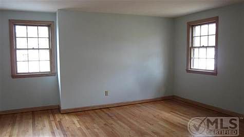 The bedrooms have been freshly painted and have beautiful hard wood floors.