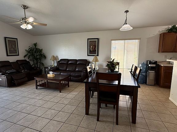 There is a beautiful family /dining room. Itcan be rented furnished with reclining sofas and entertainment center.