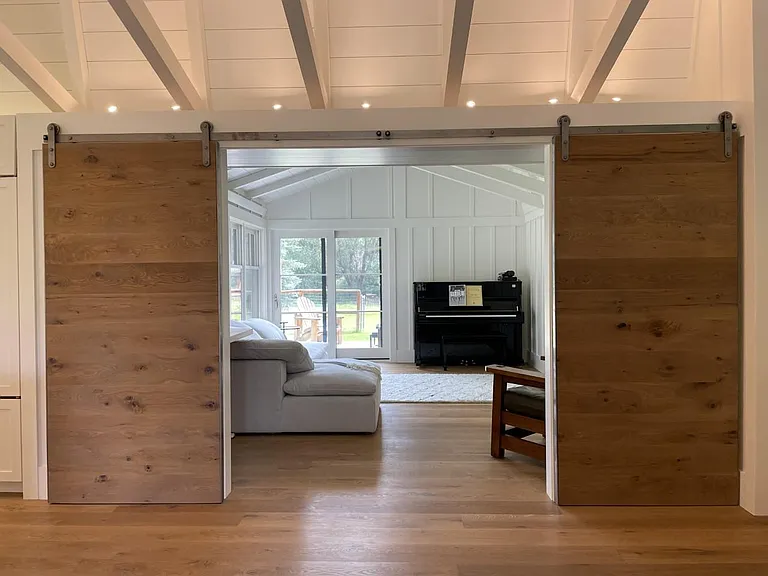 Barn doors to sunroom