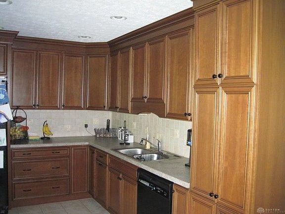 New kitchen in 2010 with ample high-end cabinetry, recessed lighting in raised ceiling, ceramic flooring.