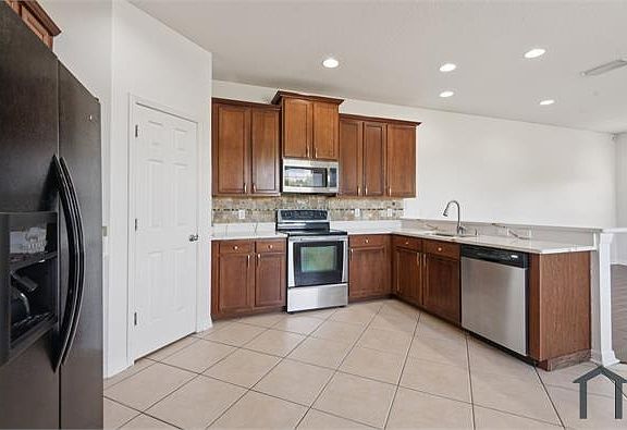 5th image of 12805 Avelar Manor Pl #3