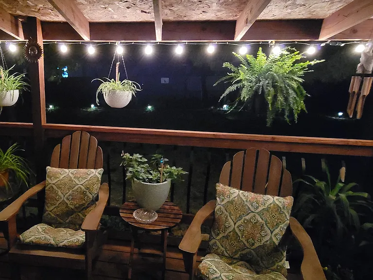 Enjoy sitting in the back deck area, overlooking the beautify garden.