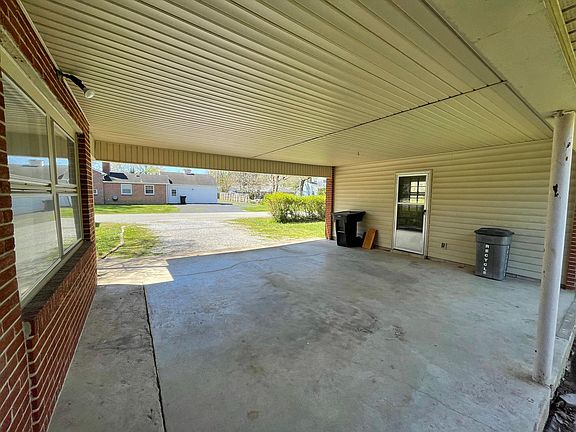 Two Car Carport w/ Tool Shed.